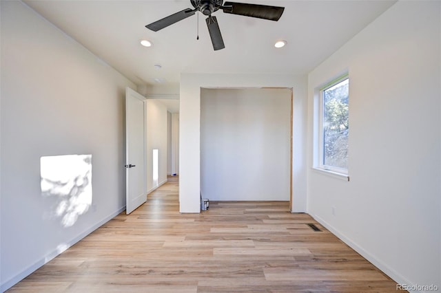 unfurnished bedroom with ceiling fan, light wood finished floors, a closet, and recessed lighting