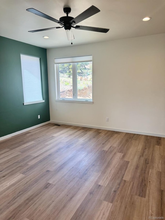 10373 Hutchinson Ln, Poncha Springs, CO 81242 - unfurnished room featuring a ceiling fan, wood finished floors, and recessed lighting