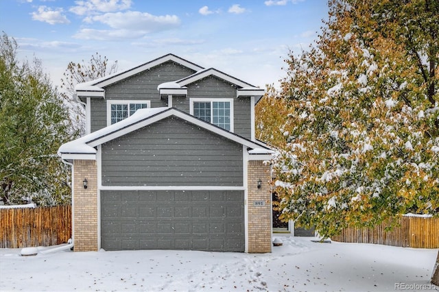 view of snow covered garage