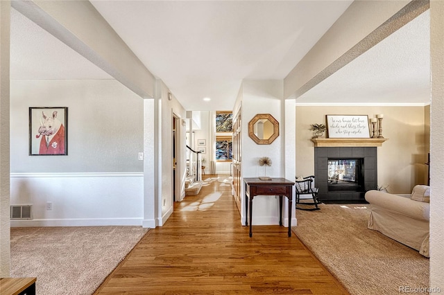 hallway with wood-type flooring