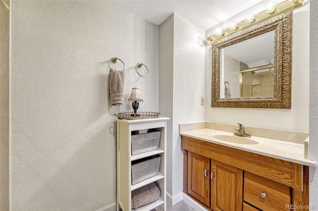 bathroom featuring vanity and walk in shower