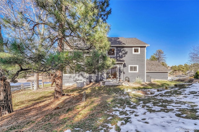 view of snow covered property