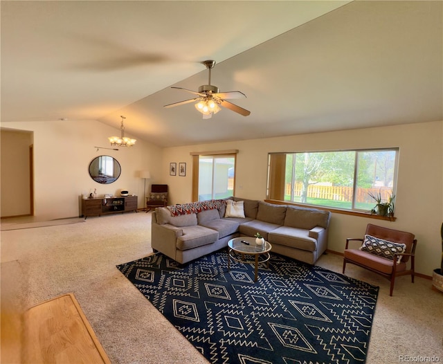 1436 H St Unit B, Salida, CO 81201 - living area featuring carpet floors, lofted ceiling, a ceiling fan, and a chandelier