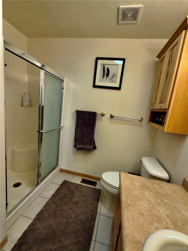 1436 H St Unit B, Salida, CO 81201 - full bathroom with tile patterned flooring, a stall shower, toilet, and vanity