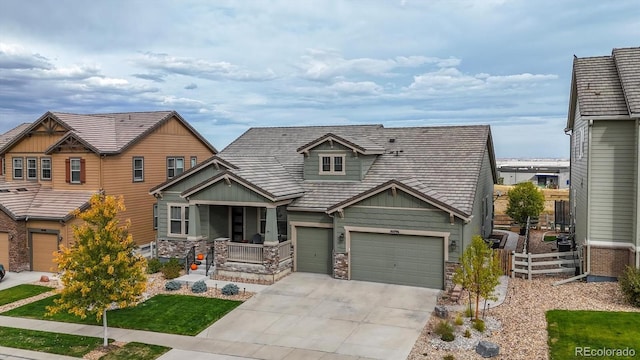 craftsman inspired home featuring a front yard and a porch