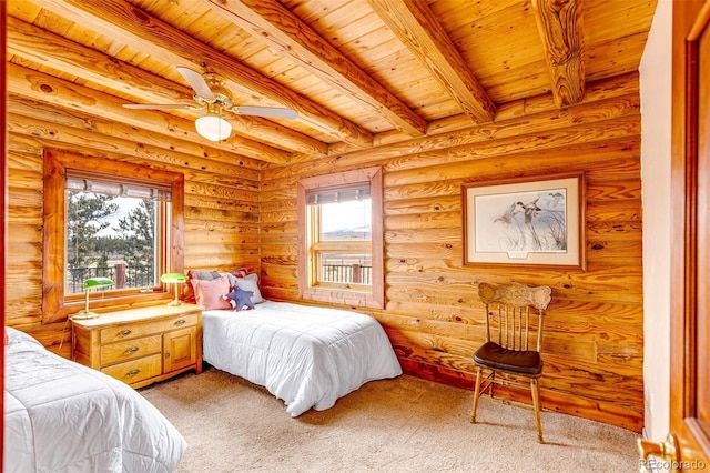 1528 Silverheels Rd, Fairplay, CO 80440 - bedroom featuring wood ceiling with exposed beams, multiple windows, light carpet, a ceiling fan, and rustic walls