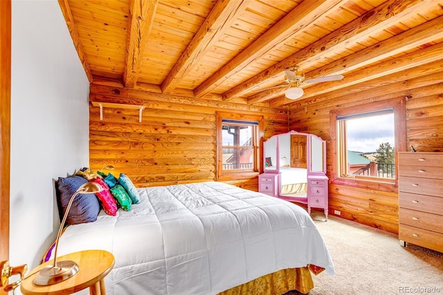 1528 Silverheels Rd, Fairplay, CO 80440 - carpeted bedroom with wood ceiling with exposed beams and a ceiling fan
