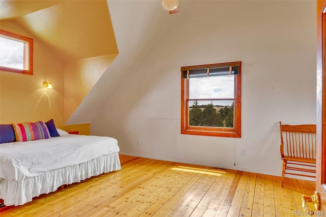 1528 Silverheels Rd, Fairplay, CO 80440 - bedroom with lofted ceiling, hardwood / wood-style floors, and baseboards