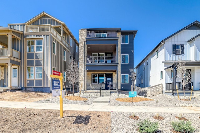 view of front of home with a balcony