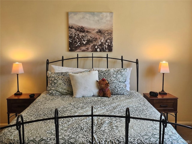bedroom featuring baseboards