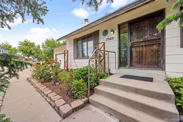 7563 Lamar Ct, Arvada, CO 80003 - doorway to property featuring a chimney