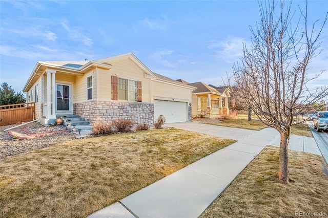 single story home with a front lawn and a garage