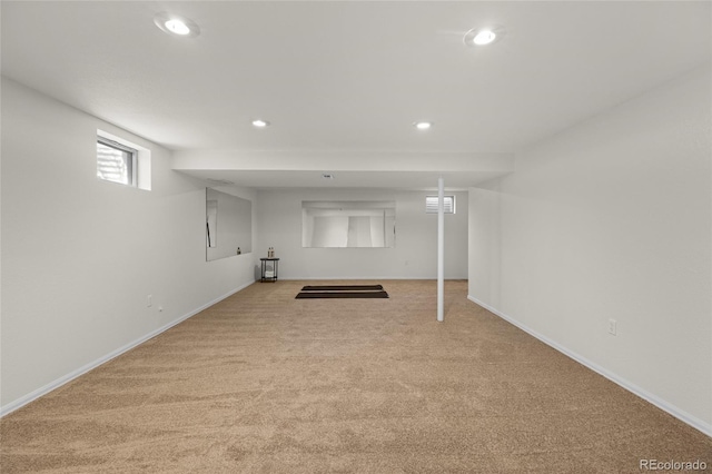 basement with carpet flooring, recessed lighting, and baseboards