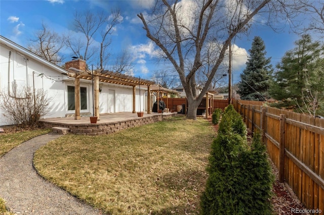 view of yard featuring a patio, a pergola, and a fenced backyard