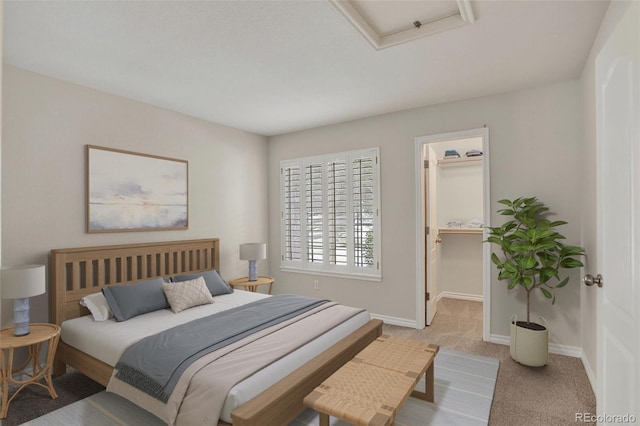 7400 W Grant Ranch Blvd Unit 9, Littleton, CO 80123 - bedroom featuring light carpet and a walk in closet