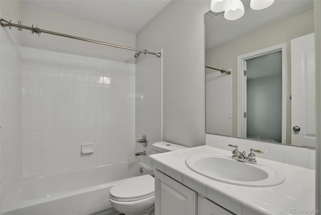 7400 W Grant Ranch Blvd Unit 9, Littleton, CO 80123 - full bathroom featuring vanity,  shower combination, and a textured wall