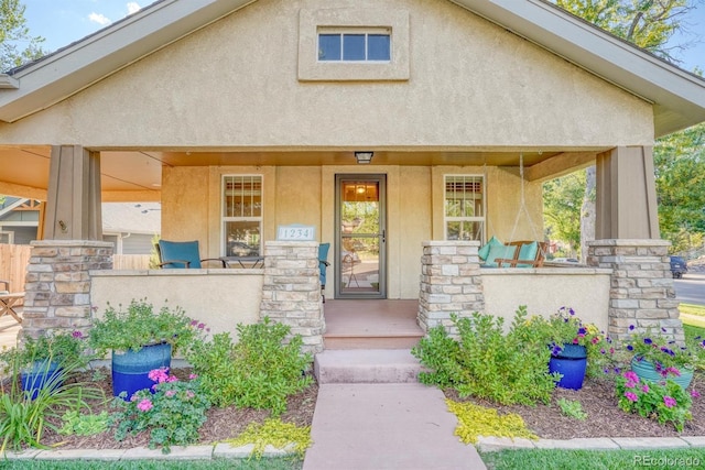 view of front of home featuring covered porch