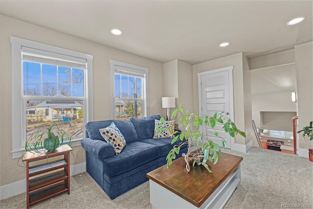 living room featuring light colored carpet