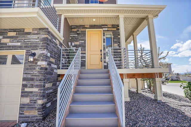 entrance to property featuring a garage