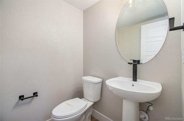2076 S Holly St Unit 1, Denver, CO 80222 - half bathroom with toilet