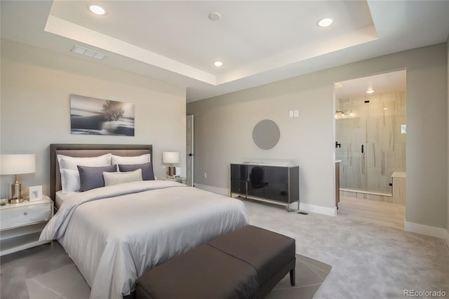 2076 S Holly St Unit 1, Denver, CO 80222 - bedroom with carpet flooring, recessed lighting, a raised ceiling, and ensuite bathroom