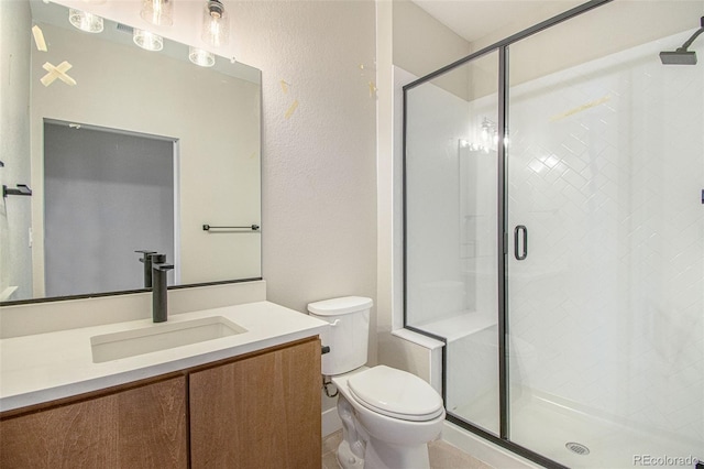2076 S Holly St Unit 1, Denver, CO 80222 - full bath featuring vanity, a stall shower, and a textured wall