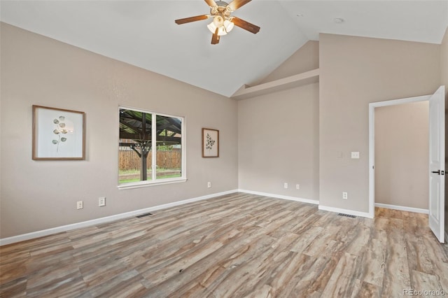 12532 Mount Belford Way, Peyton, CO 80831 - spare room featuring ceiling fan, wood finished floors, high vaulted ceiling, and baseboards