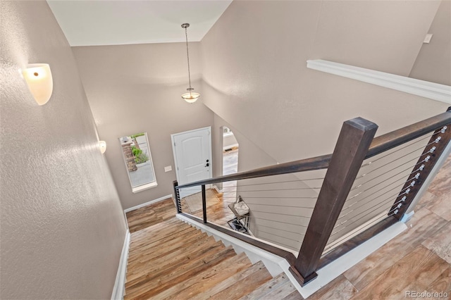12532 Mount Belford Way, Peyton, CO 80831 - stairway with wood finished floors and baseboards
