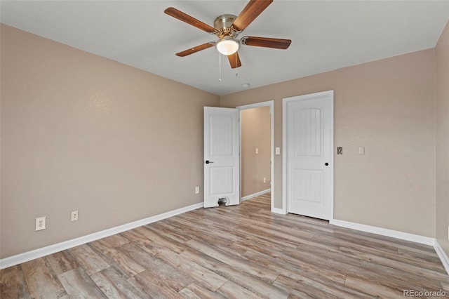 12532 Mount Belford Way, Peyton, CO 80831 - unfurnished bedroom featuring baseboards, light wood-style floors, and ceiling fan