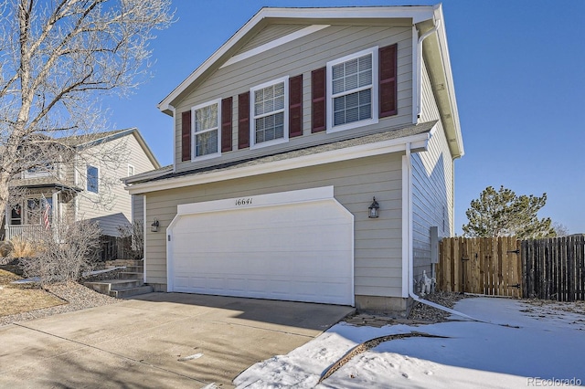 front of property with a garage