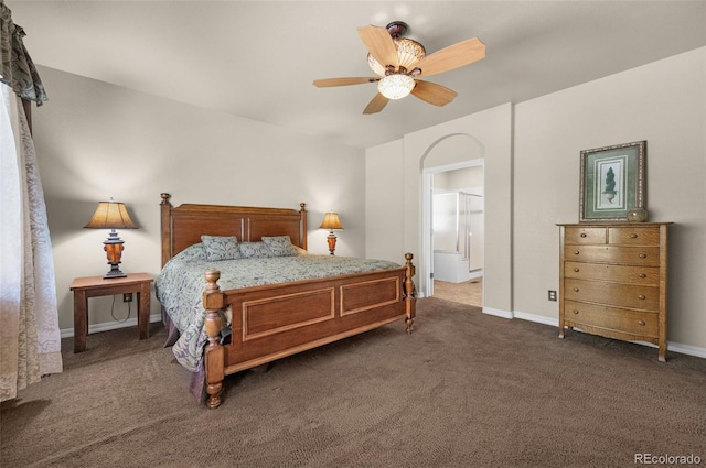 15616 Soo Line Way, Monument, CO 80132 - bedroom with dark carpet, baseboards, and a ceiling fan