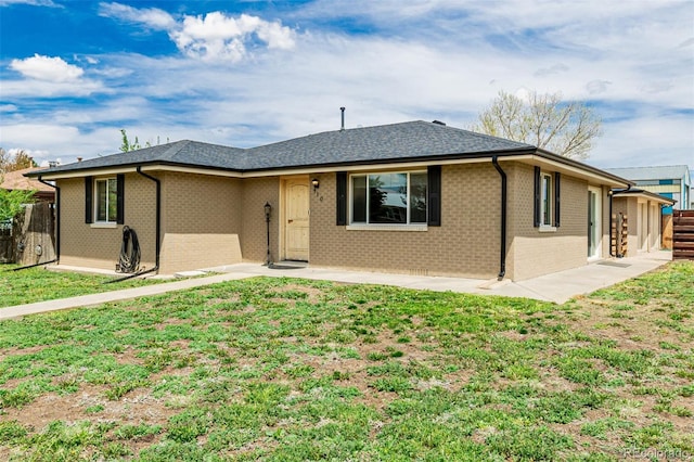 710 4th St, Bennett, CO 80102 - ranch-style house with brick siding