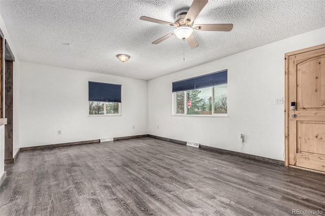 710 4th St, Bennett, CO 80102 - empty room with wood finished floors, a ceiling fan, a textured ceiling, and baseboards
