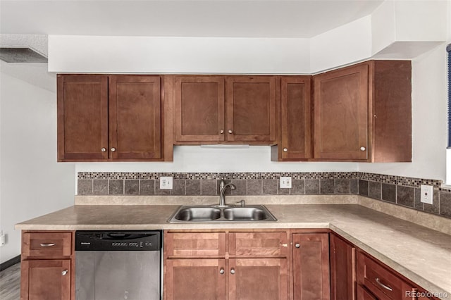 710 4th St, Bennett, CO 80102 - kitchen featuring dishwasher, a sink, and wood finished floors