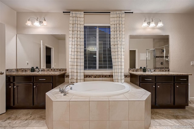 bathroom with separate shower and tub, tile patterned flooring, and vanity