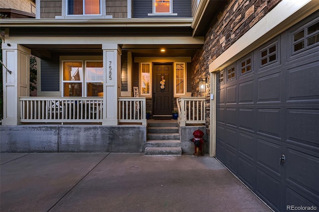 doorway to property with a porch