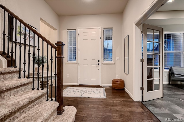 foyer entrance featuring dark hardwood / wood-style flooring