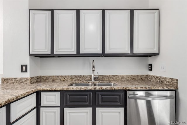 772 Ivywood Ct, Highlands Ranch, CO 80126 - kitchen with stainless steel dishwasher, a sink, and white cabinetry