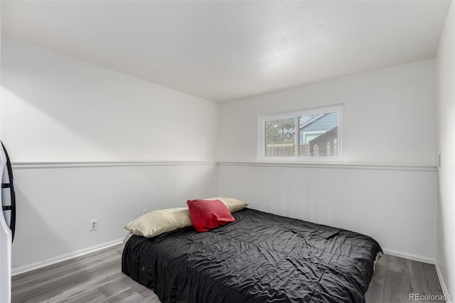 772 Ivywood Ct, Highlands Ranch, CO 80126 - bedroom with wood finished floors and baseboards