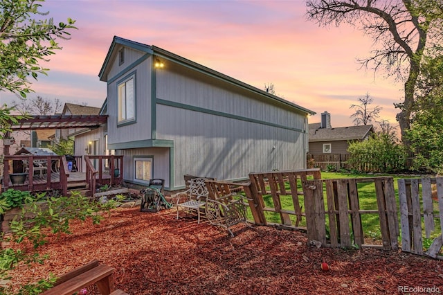 772 Ivywood Ct, Highlands Ranch, CO 80126 - view of side of home featuring a wooden deck, a pergola, and fence