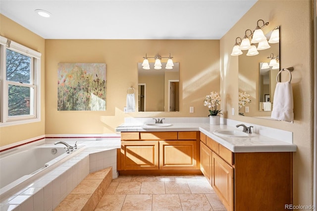 bathroom with a sink, a bath, and double vanity