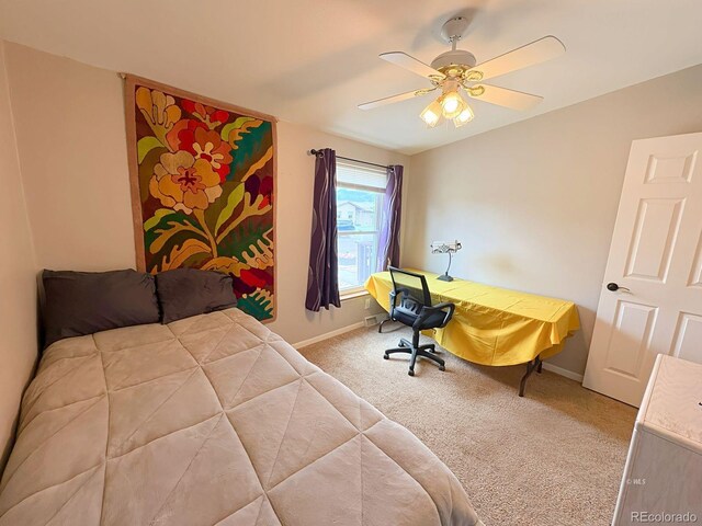 29 Granada Ct, Silver Cliff, CO 81252 - bedroom featuring carpet floors, baseboards, and a ceiling fan