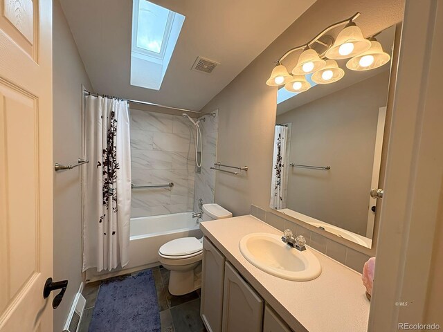 29 Granada Ct, Silver Cliff, CO 81252 - full bath with a skylight, toilet, shower / bath combo, vanity, and vaulted ceiling