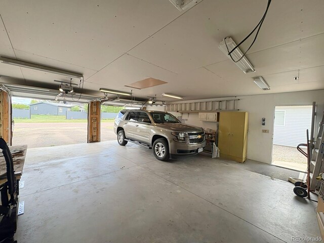 29 Granada Ct, Silver Cliff, CO 81252 - garage with a garage door opener
