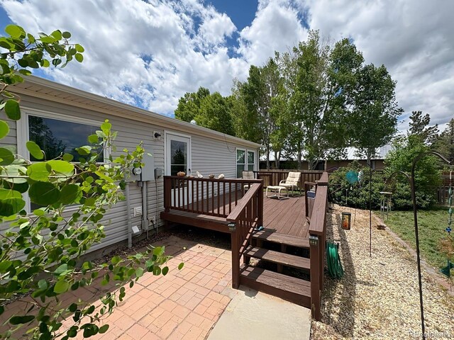 29 Granada Ct, Silver Cliff, CO 81252 - wooden terrace with a patio area