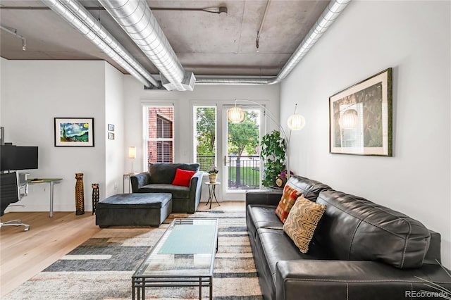 3401 Arapahoe Ave Unit 105, Boulder, CO 80303 - living room featuring wood finished floors