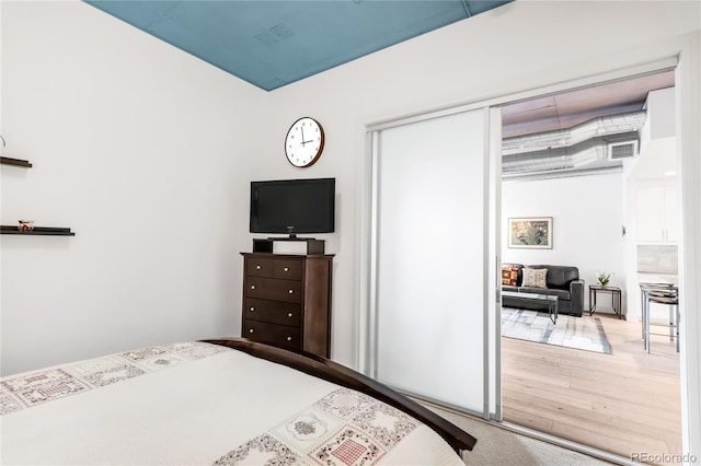 3401 Arapahoe Ave Unit 105, Boulder, CO 80303 - bedroom featuring wood finished floors