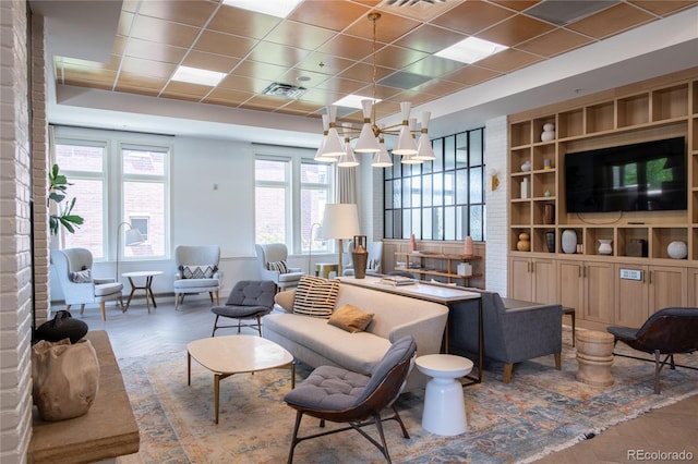 3401 Arapahoe Ave Unit 105, Boulder, CO 80303 - living area featuring wood finished floors and a paneled ceiling