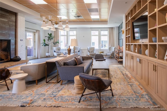 3401 Arapahoe Ave Unit 105, Boulder, CO 80303 - living room featuring healthy amount of natural light and a fireplace