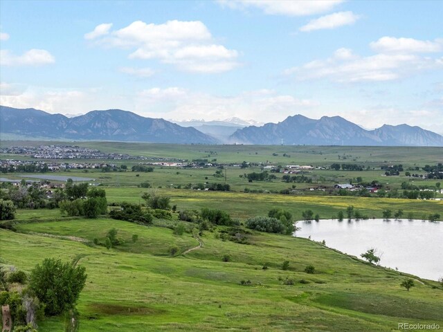 10954 W 100th Way, Broomfield, CO 80021 - view of mountain backdrop featuring a large body of water and rural landscape